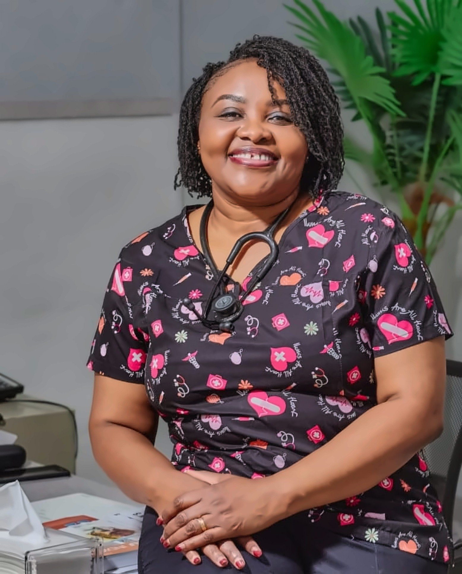 Portrait of Dr Lalou Mupompa in her consulting room